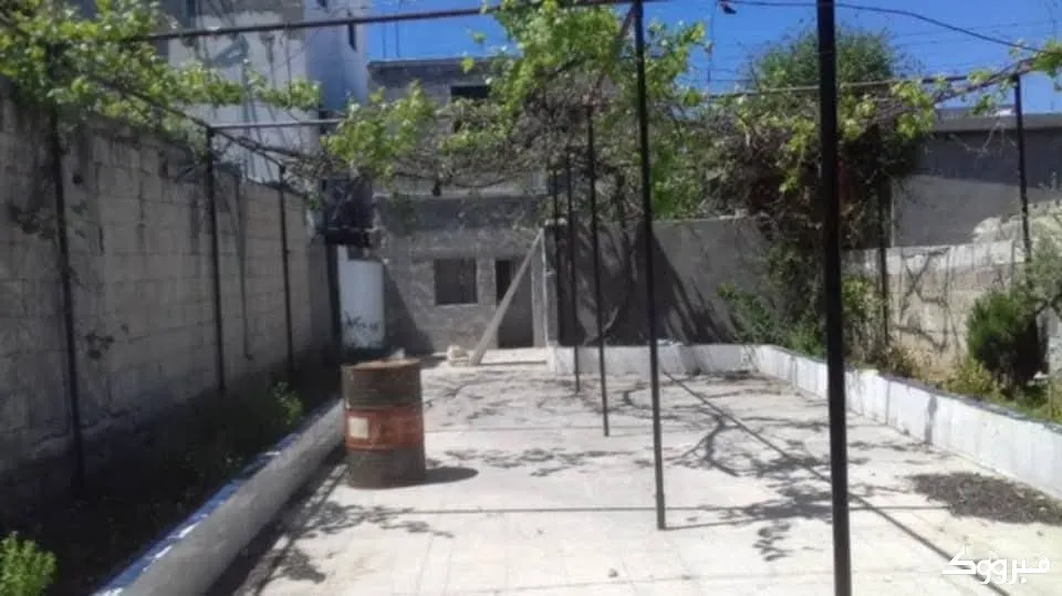 ارض مع طابقين /طرطوس/راس الشغري طرطوس - الصورة 1